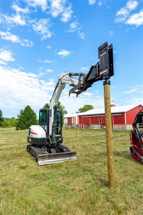 mini digger post driver|mini excavator pile driver attachment.